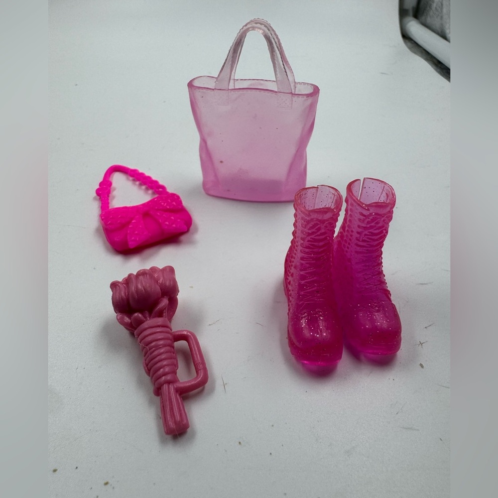 Lot of 4 pink Barbie purses, boots and flowers for 12” fashion dolls.